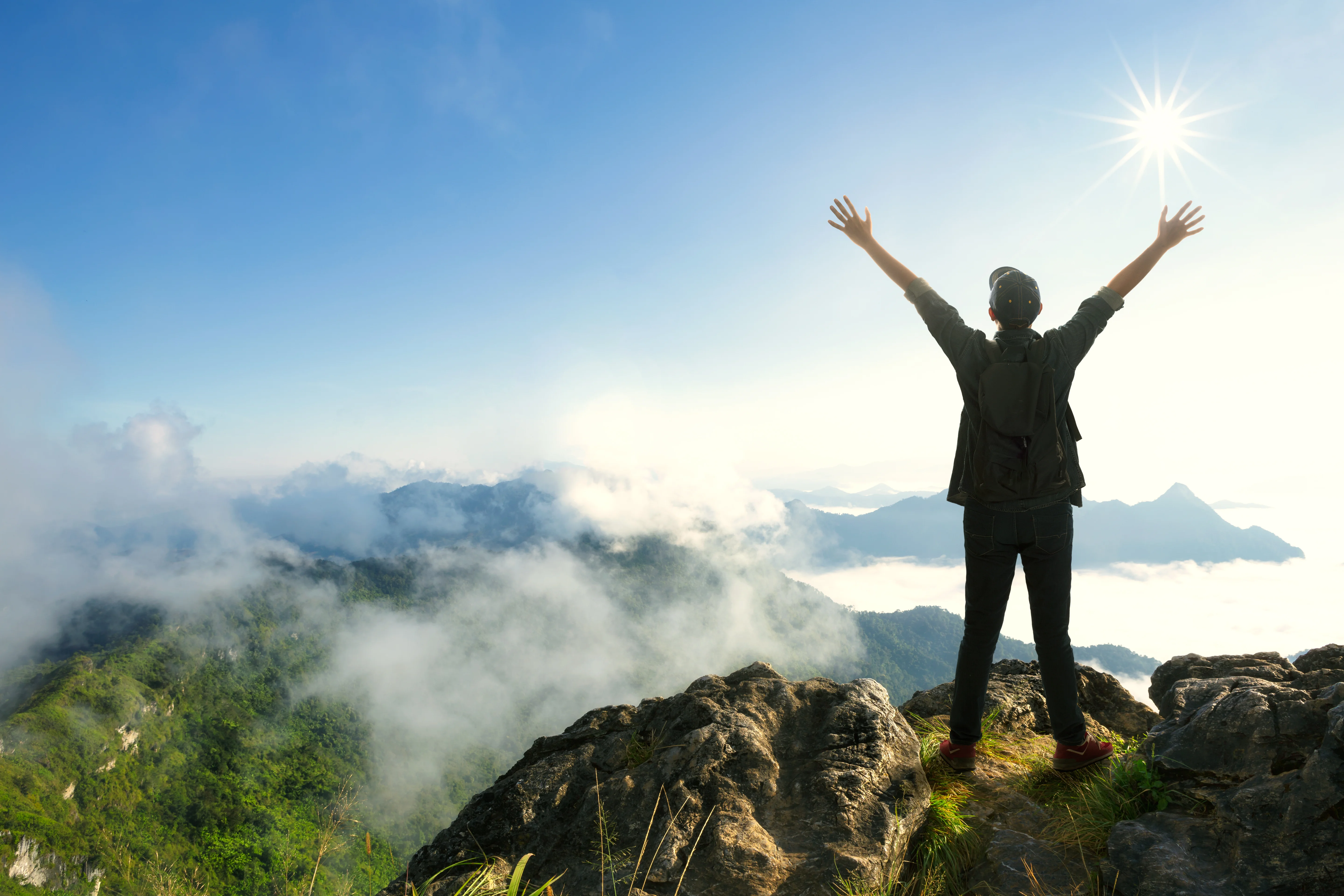 Happy male student experiencing adventure and freedom